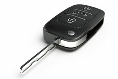 Remote entry car key fob with integrated key