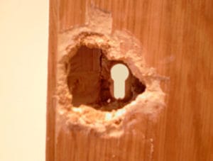 Damaged wooden door