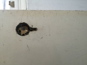Hole in Deadlock door image