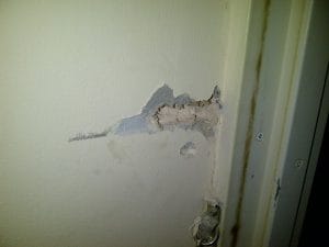 Locksmith damages wall