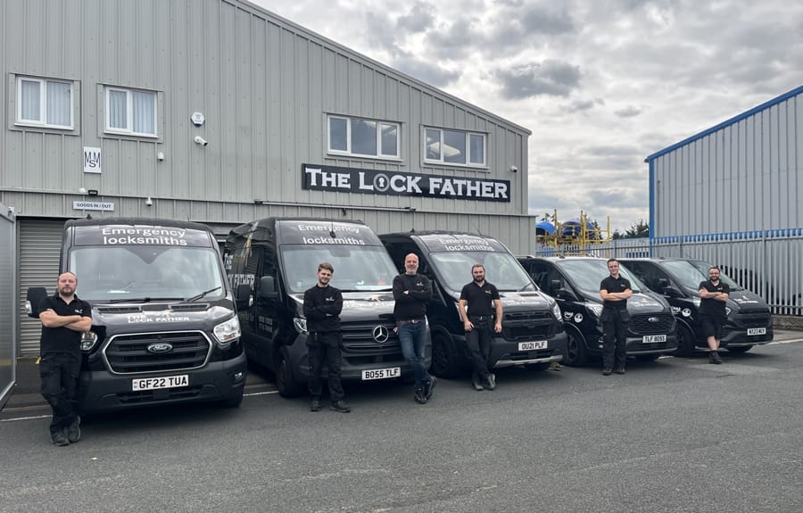 The Lock Father - Emerency master locksmiths - locksmiths in front of vans