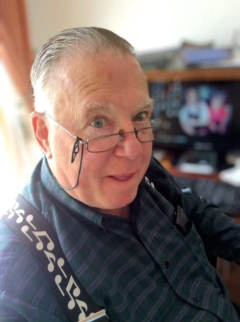 Colin Harper‑Smith (Uncle Colin) seated at home. 